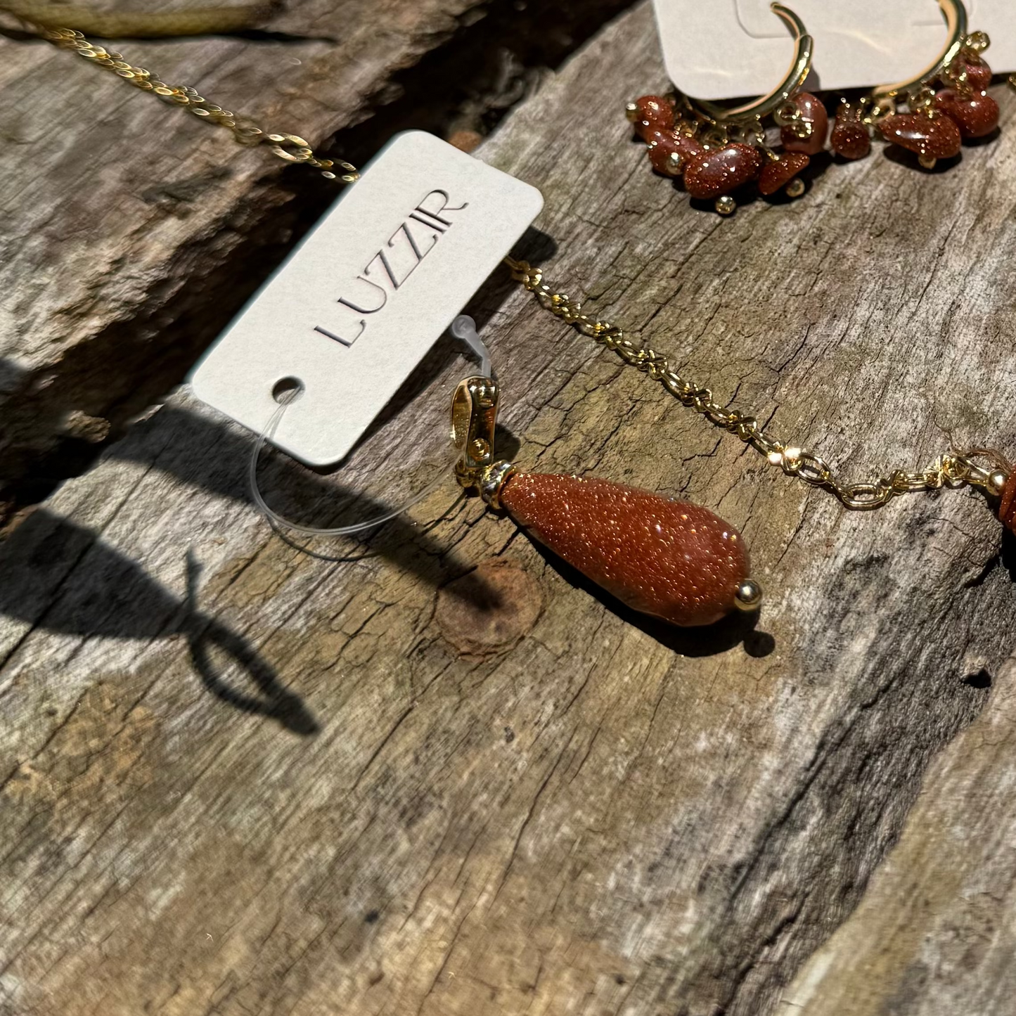 pingente pedra do sol gota banhado a ouro luzzir