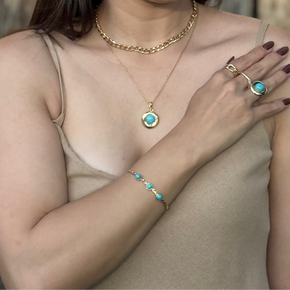 bracelete dourado feminino com três pedras turquesa design torcido